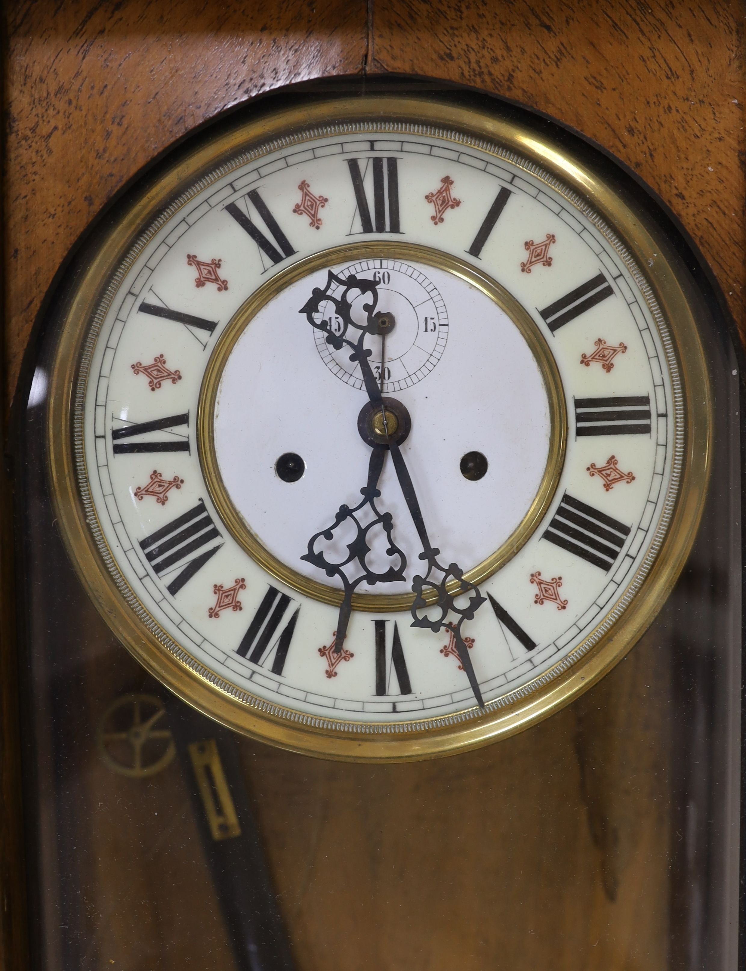 A Vienna Regulator wall clock, 102 cms high.